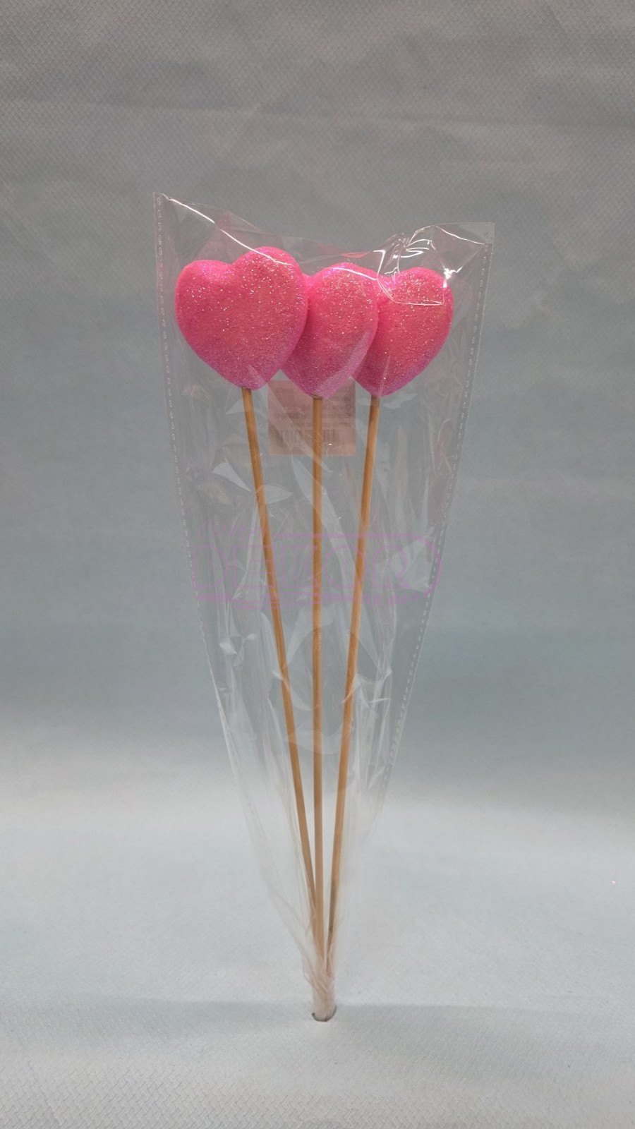 srca na štapiću roze boje