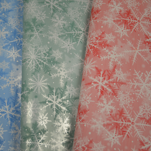 Novogodišnji ukrasni papiri u različitim bojama